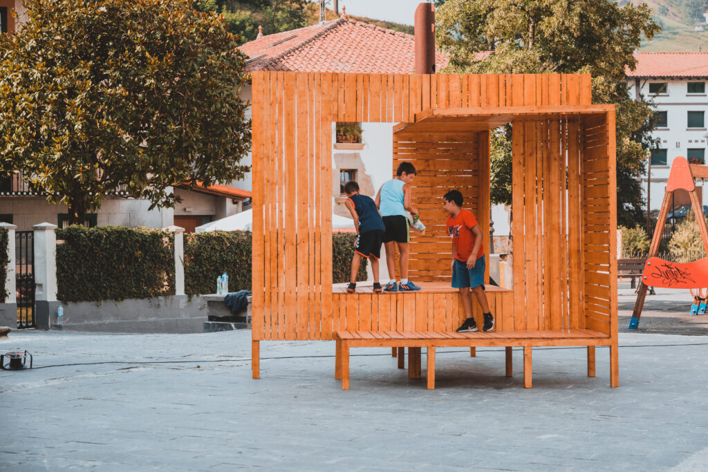 Timber structure and play landscape on the square in Zaldibia