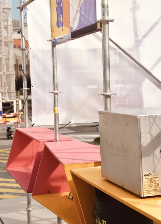 Red seating boxes and scaffolding